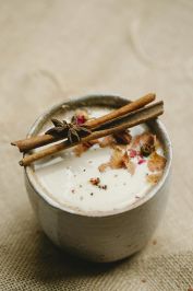 Cup of masala chai on table