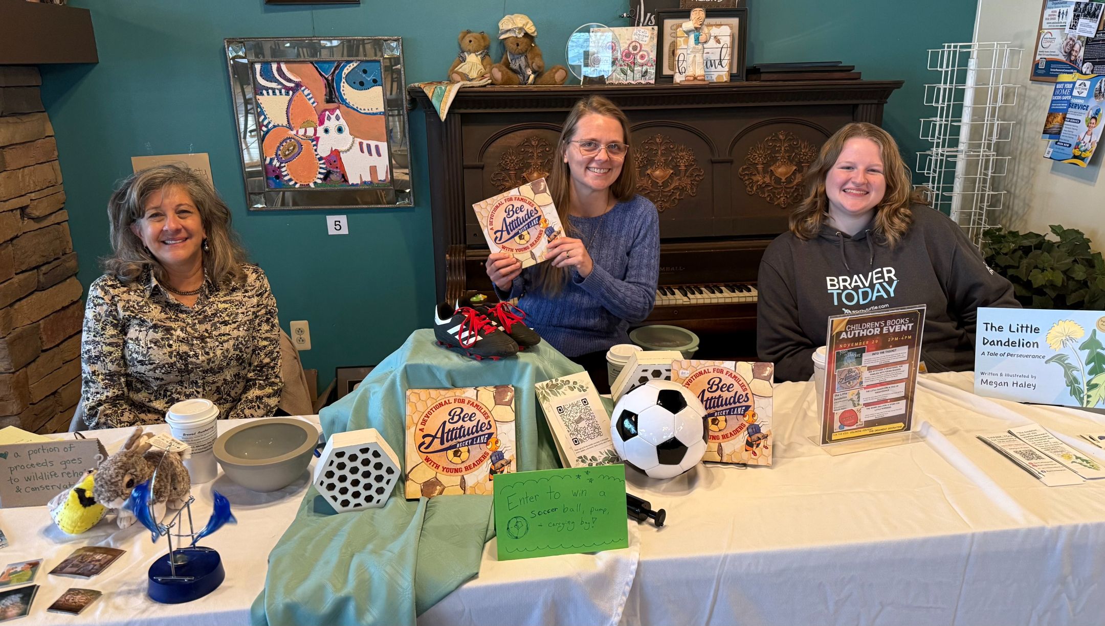 Gail, Becky and Megan at their book table at Brewed Awakenings
