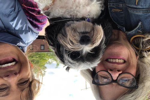 Selfie of Peggy, Gail and small dog in the middle.