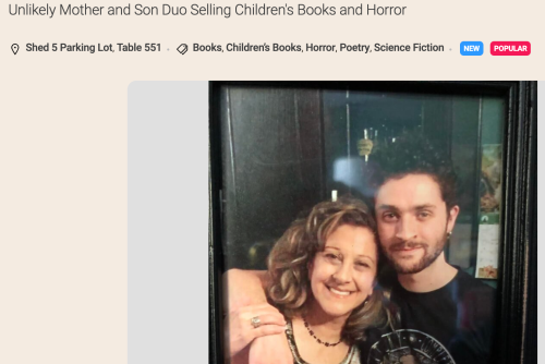 A mother and son arm in arm, smiling.